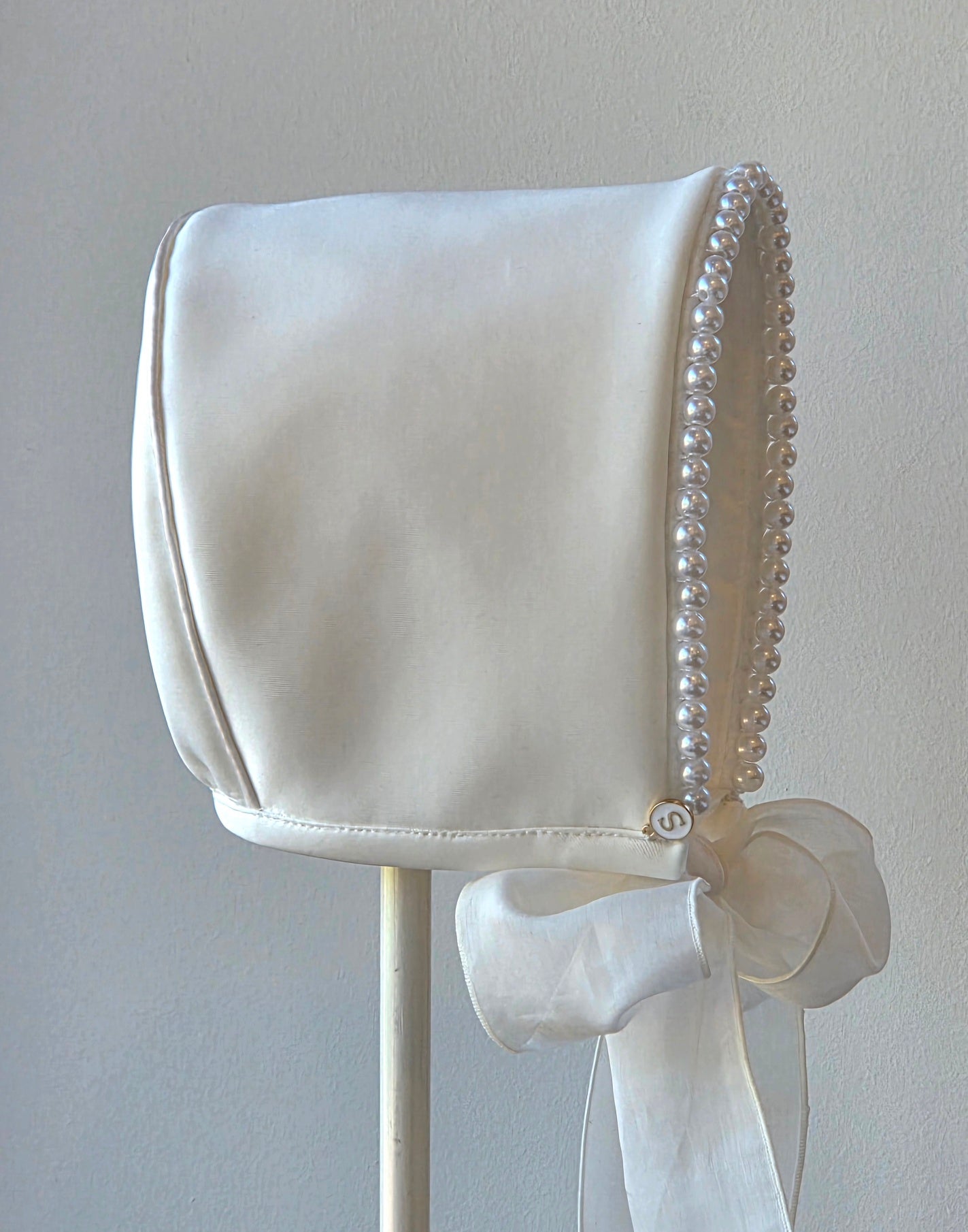 Exclusive Ivory Ponte Bonnet with pearl beaded trim